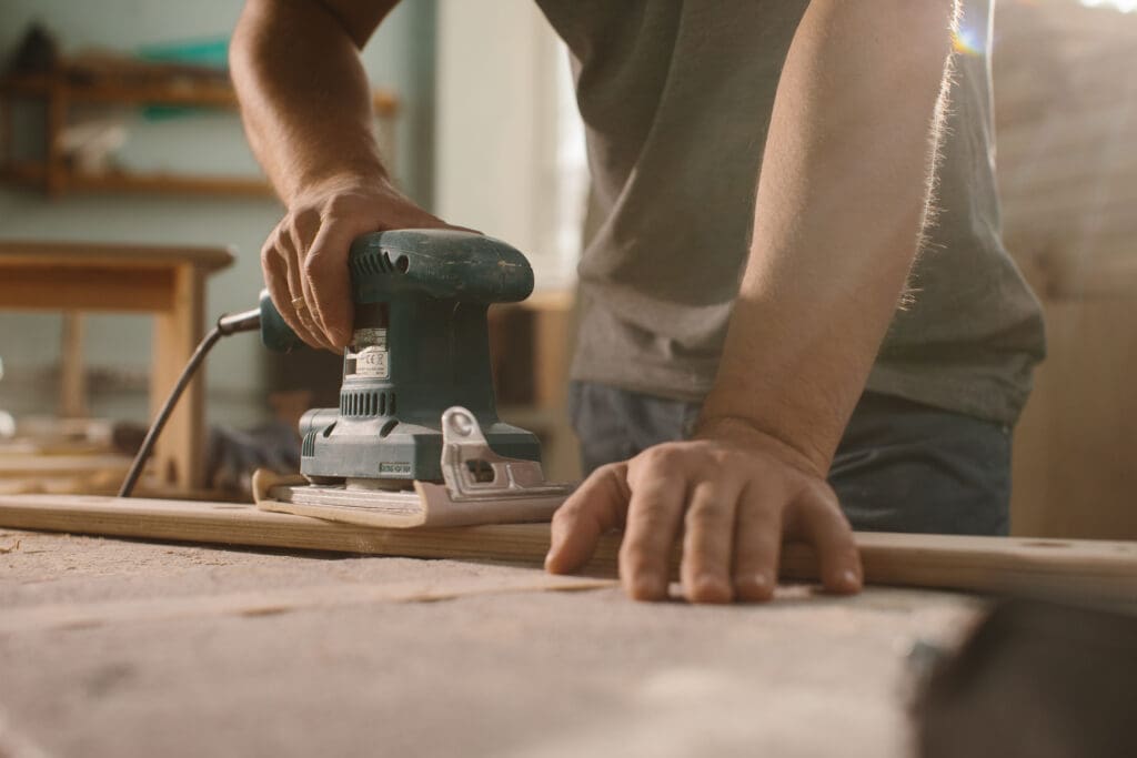 Grinding machine on wood surface